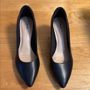 Clark’s black leather upper heels